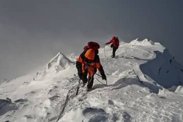 Photo of climbers climbing Mount Everest demonstrating a hard road